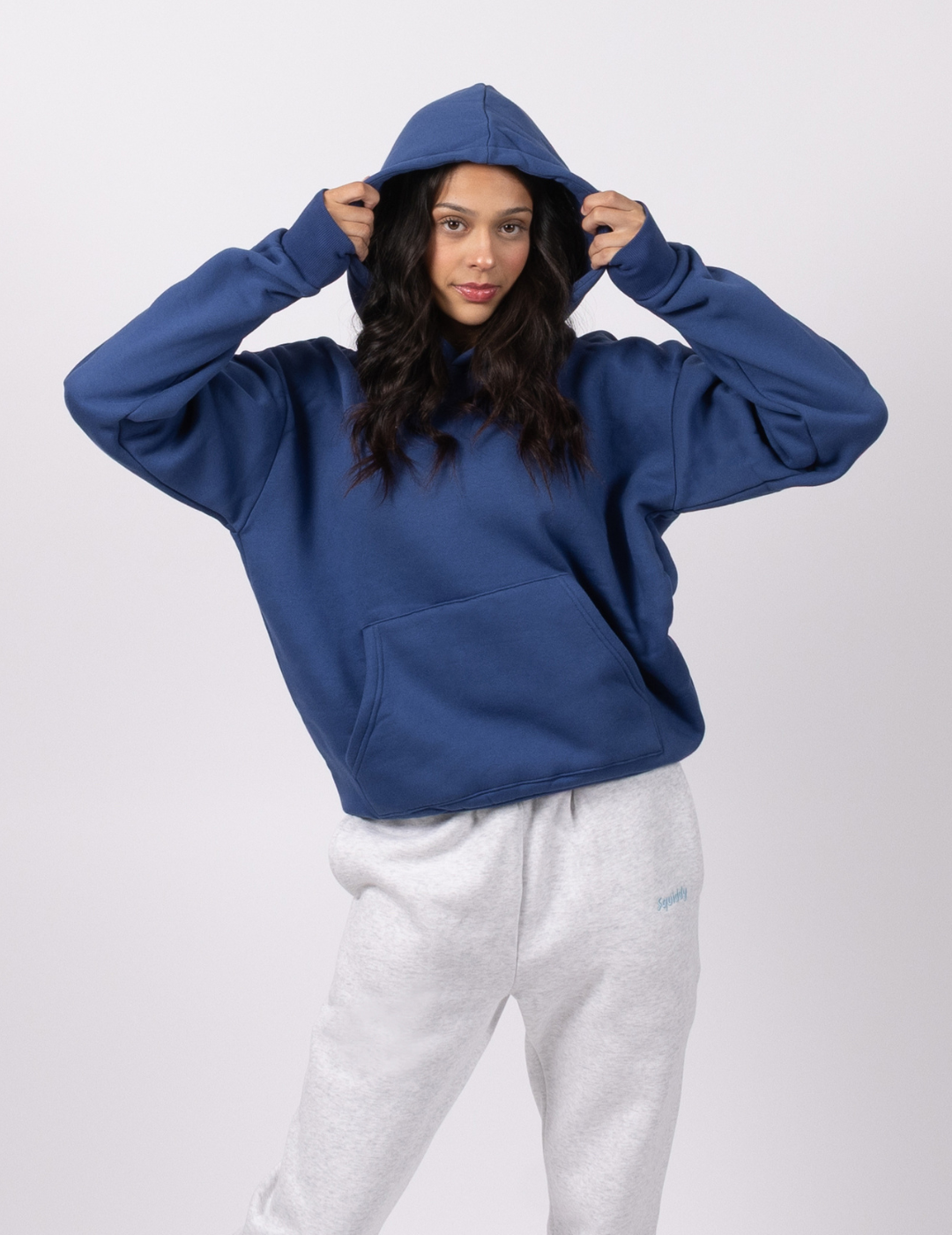 “Squiddy” Classic Hoodie - Navy Blue Model Photo Weighted Cosy Builtin Squishies