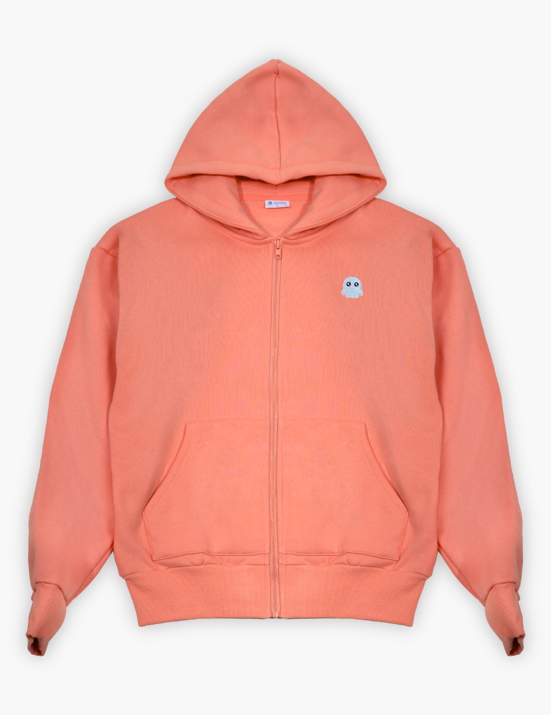 Peach-colored hoodie with a small logo on a light gray background