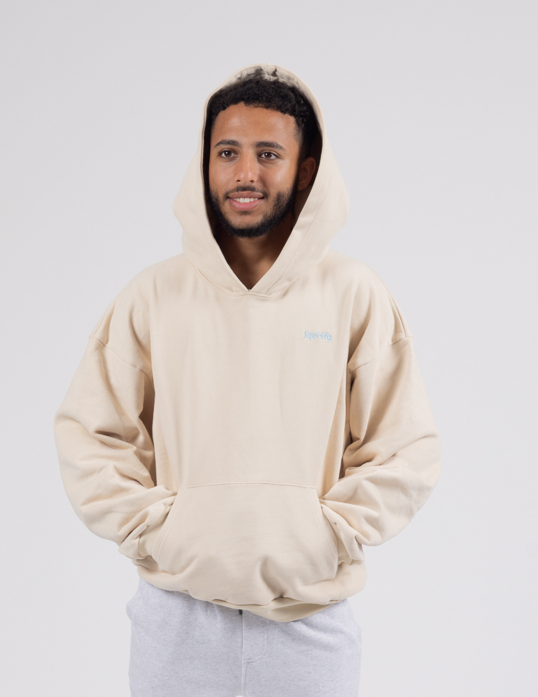 Beige Signature Squiddy Hoodie- Oversized stress ball hoodie with squishy cuffs