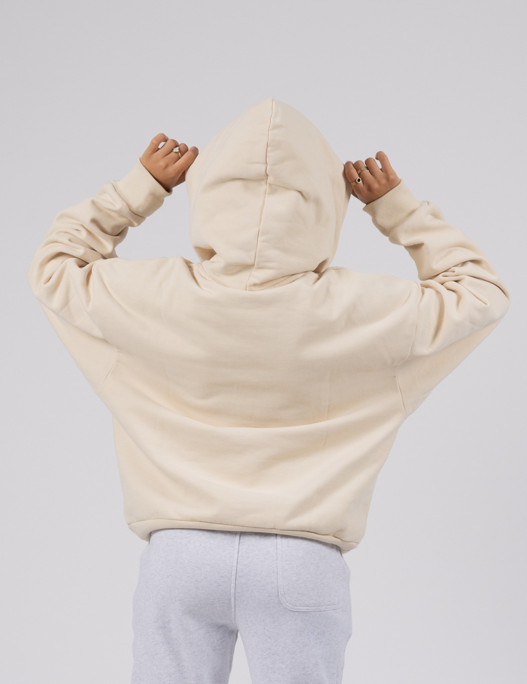 Beige The Signature Squiddy Hoodie- Oversized stress ball hoodie with squishy cuffs